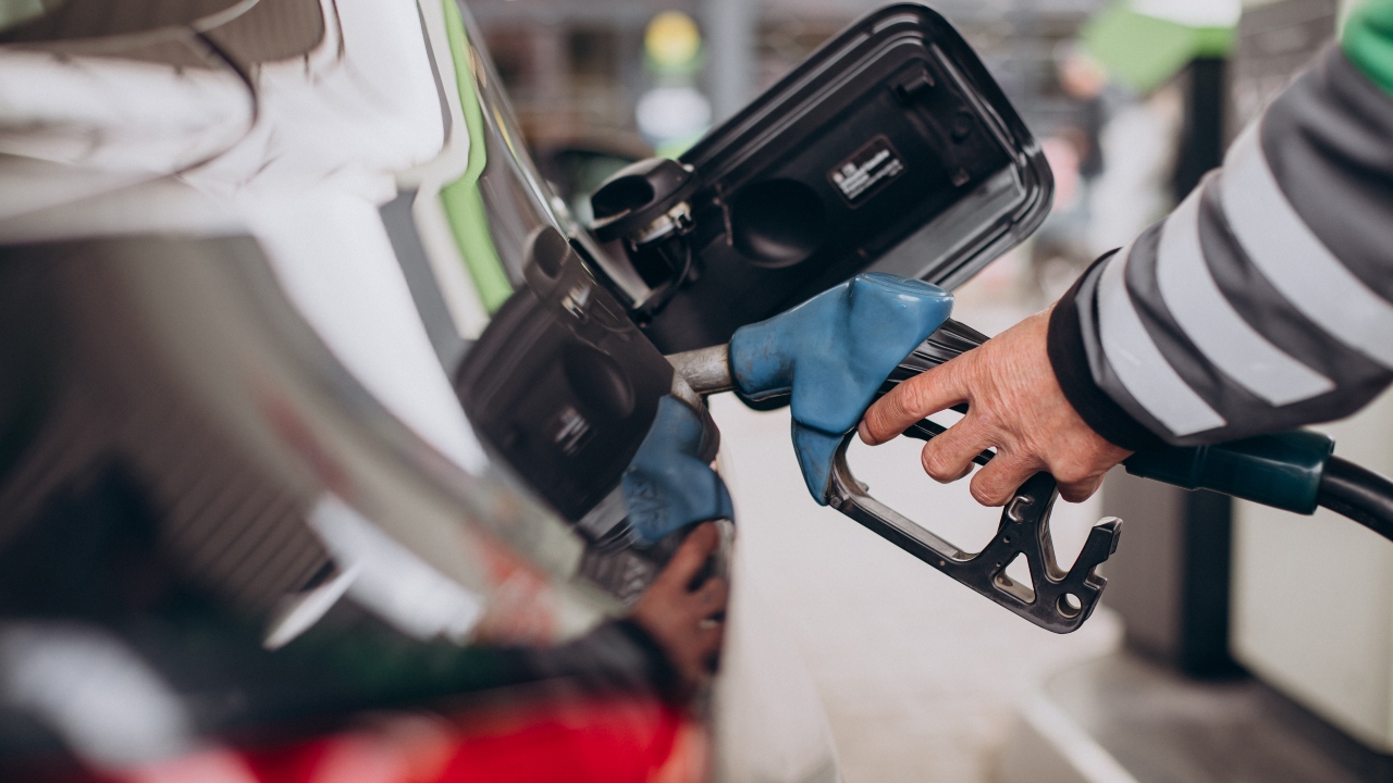 Car refueling at fuel station